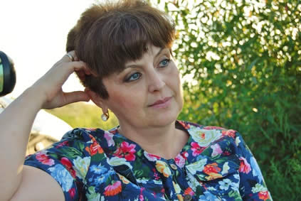 Image: /uploads/blog/woman%20next%20to%20car.jpg